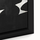 Close-up view of an abstract minimalist wall art piece featuring soft pastel colors and organic shapes, framed in a sleek black border, perfect for modern decor.