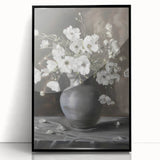 Framed acrylic artwork showcasing vibrant abstract florals in shades of pink and blue, set against a sleek black background, perfect for modern decor.