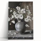 Vibrant abstract floral stretched canvas artwork featuring bold colors and intricate designs, elegantly leaning against a neutral wall, perfect for modern decor.