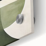 Close-up of abstract minimalist wall art featuring soft pastel colors and geometric shapes, designed for modern home decor, highlighting its acrylic and glass finish.