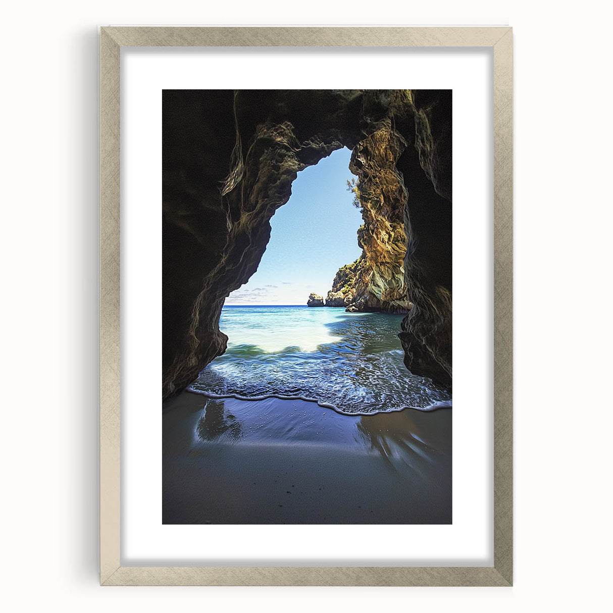 Framed landscape artwork depicting a serene cave scene, featuring a silver mat and sleek wooden frame, ideal for enhancing home decor with natural beauty.