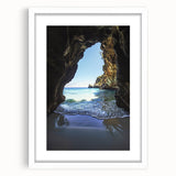 Framed landscape artwork depicting serene caves with a white mat, showcasing intricate details and vibrant colors, perfect for home decor.