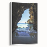 Framed canvas artwork depicting a serene cave landscape with intricate details and natural colors, set against a white background, ideal for home decor.