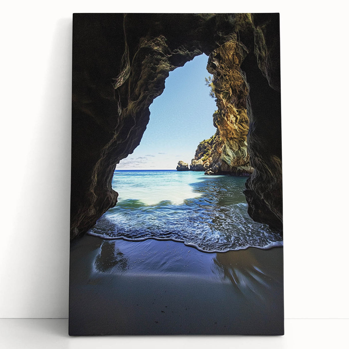 Stretched canvas artwork showcasing a vibrant landscape with intricate cave formations, leaning against a textured wall, ideal for home decor enthusiasts.