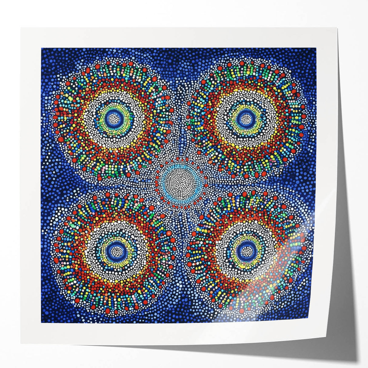 Abstract geometric artwork featuring bold colors and sharp lines, displayed in a glossy photo print mockup, ideal for modern home decor or artistic inspiration.