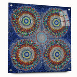 Abstract geometric acrylic glass art piece displayed from the side, showcasing vibrant colors and unique shapes, secured with decorative pins for stability.