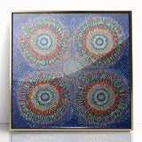 Framed acrylic art piece showcasing an abstract geometric design in gold tones, featuring sharp angles and a modern aesthetic, perfect for contemporary decor.