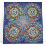 Abstract geometric wall art on stretched canvas, showcasing vibrant colors and sharp angles, leaning against a neutral wall, perfect for modern home decor.