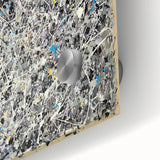 Abstract acrylic glass artwork showcasing vibrant splatters of color in a close-up view, ideal for modern decor and artistic displays. Perfect for adding a dynamic touch to any space.