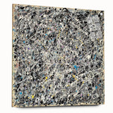 Abstract acrylic glass artwork displaying vibrant splatters in various colors, mounted with pins for stability. Ideal for modern decor, enhancing any space with a bold artistic touch.