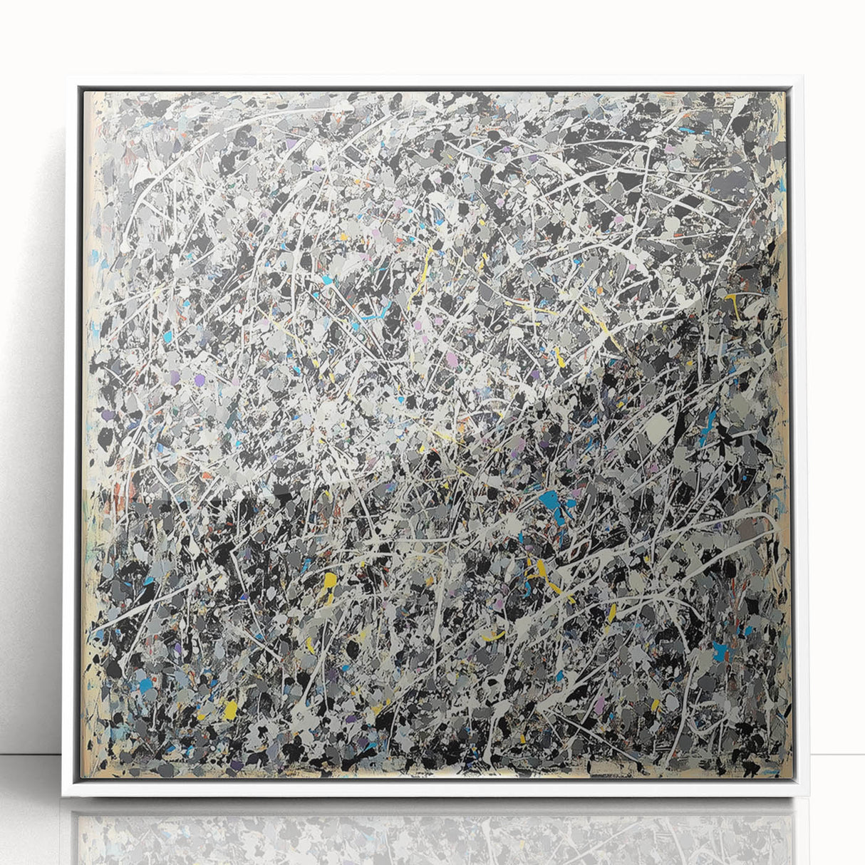 Framed acrylic artwork featuring vibrant abstract splatters in bold colors, set against a crisp white background, ideal for modern home decor.