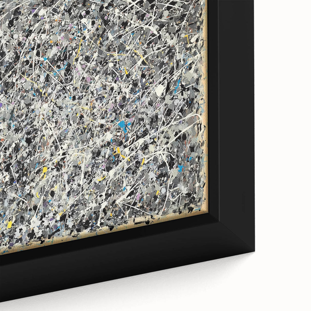 Close-up of an abstract splatter design on a framed canvas, showcasing vibrant color blending and dynamic textures, ideal for modern home decor and artistic ambiance.