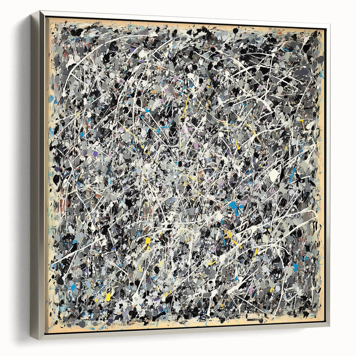 Framed canvas art showcasing abstract splatters in vibrant colors with a sleek silver frame, perfect for modern home decor or gallery settings.