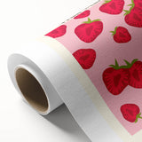 Art Deco-style poster featuring an array of colorful fruits on a rolled canvas.