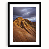 Framed desert landscape artwork with a black mat and sleek black frame, showcasing warm earthy tones and vast skies, perfect for home decor.