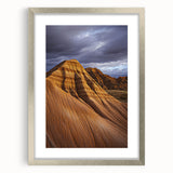 Framed desert landscape artwork with a silver mat display, showcasing vibrant colors and intricate details, perfect for enhancing modern home decor settings.