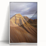 Framed acrylic artwork depicting a vibrant desert landscape, featuring warm hues of orange and yellow with a clear blue sky, ideal for modern home decor.