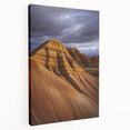 Stretched canvas artwork depicting a vibrant desert landscape, showcasing warm hues of orange and yellow, perfect for enhancing home decor with a natural touch.