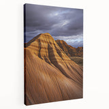 Stretched canvas artwork depicting a vibrant desert landscape, showcasing warm hues of orange and yellow, perfect for enhancing home decor with a natural touch.