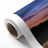 Stunning rolled canvas artwork showcasing a serene desert landscape with golden dunes under a vibrant blue sky, perfect for enhancing home decor.