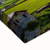 Large art featuring a black and white landscape painting of Georgian scenery on stretched canvas.