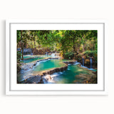 Abstract art print of a Laos scenery in muted earth tones on a framed white mat, ideal for dining room decor.