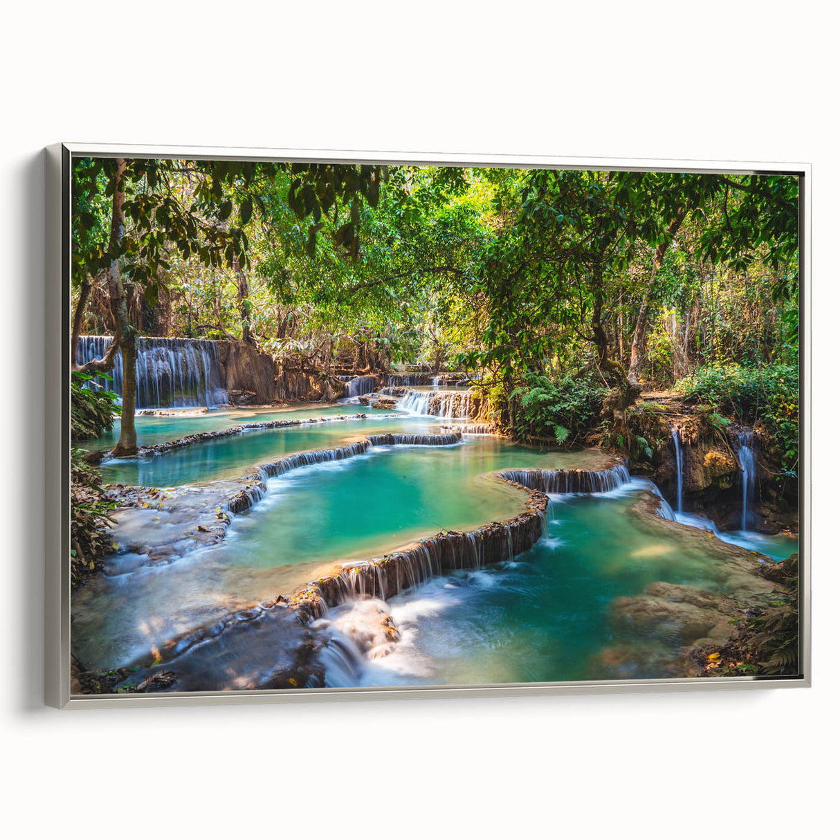 Landscape art painting featuring a serene Laos scenery in colorful hues on a silver-framed canvas.