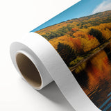 Art deco poster of Quebec scenery on rolled canvas, featuring muted earth tones, ideal for nursery wall art.