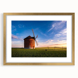 Extra large abstract art print depicting a textured European scenery in muted earth tones, framed in gold.