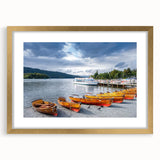 Abstract art print of Cumbria's landscape in muted earth tones, framed in gold, suitable for dining room decor.