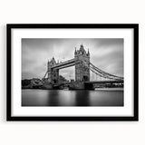 Extra large abstract art print of a colorful London skyline on textured canvas, framed in black, ideal for living room decor.