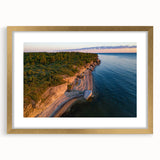 Abstract art print of a European landscape in muted earth tones, framed in gold, suitable for dining room decor.