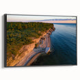 Black and white wall art featuring a vintage poster-style landscape of Estonia, framed canvas ideal for bedroom decor.