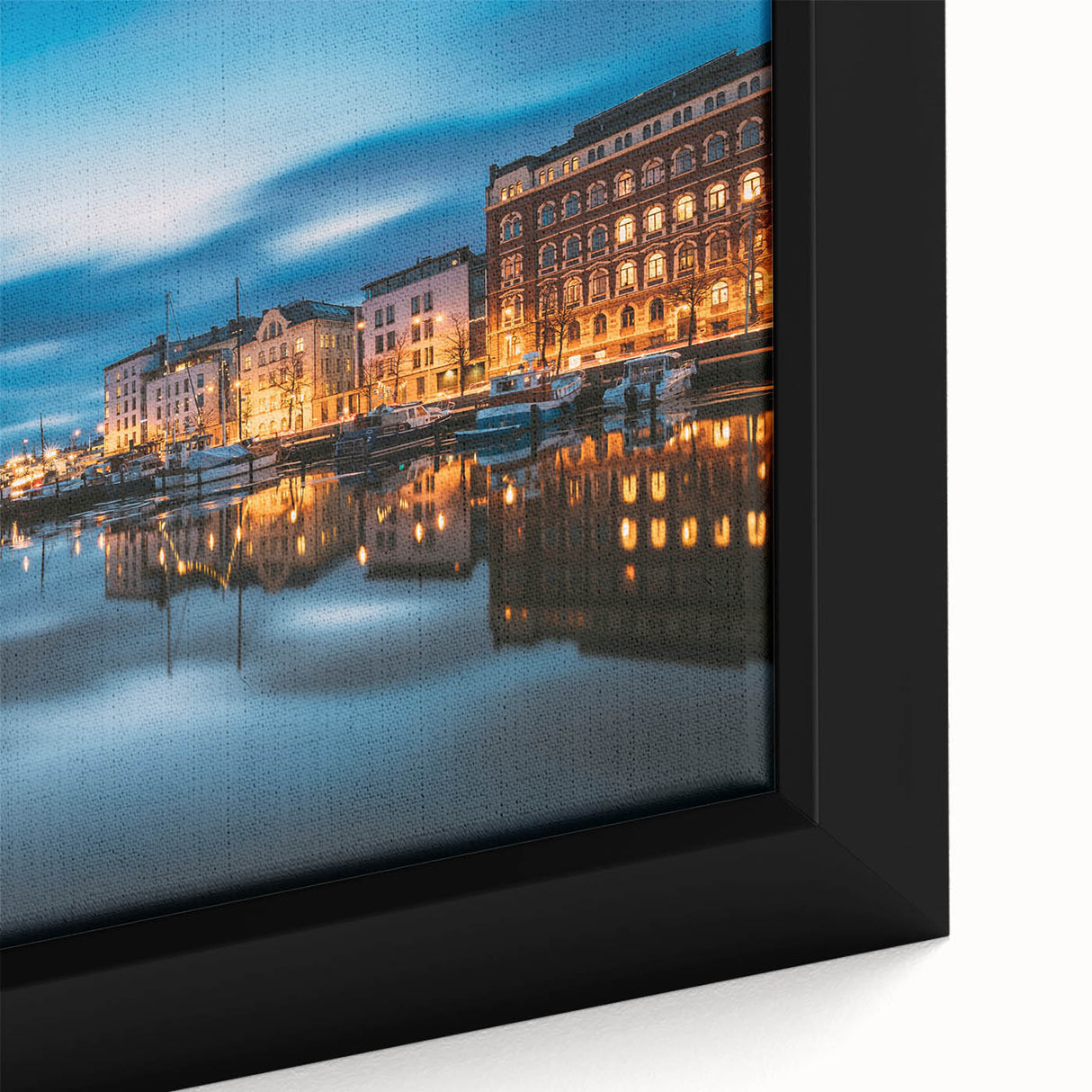 Extra large framed canvas featuring a textured depiction of a European scenery in black with colorful art accents.
