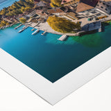 Art deco poster of French Alps in faded blue tones on rolled canvas, ideal for dining room wall art.