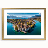 Extra large wall art of abstract French Alps scenery in textured shades of blue and white, framed in gold.