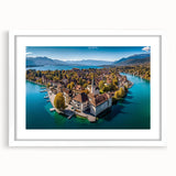 Abstract art print depicting the French Alps in muted blue and white tones, framed with a white mat.