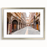 Extra large abstract art print of Lyon, featuring textured swirls in muted gray tones on a framed canvas.