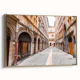 Framed canvas depicting vintage-style Lyon landscape in black and gold tones, ideal for bedroom wall art.