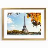 Abstract art print of Paris scenery in muted gold and gray tones on a framed canvas, suitable for dining room decor.