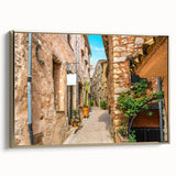 Framed canvas depicting a vintage-style landscape of Southern France in muted gold and black tones.