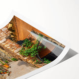 Extra large wall art featuring line art flowers in muted earth tones on a rolled canvas, ideal for large living room decor.