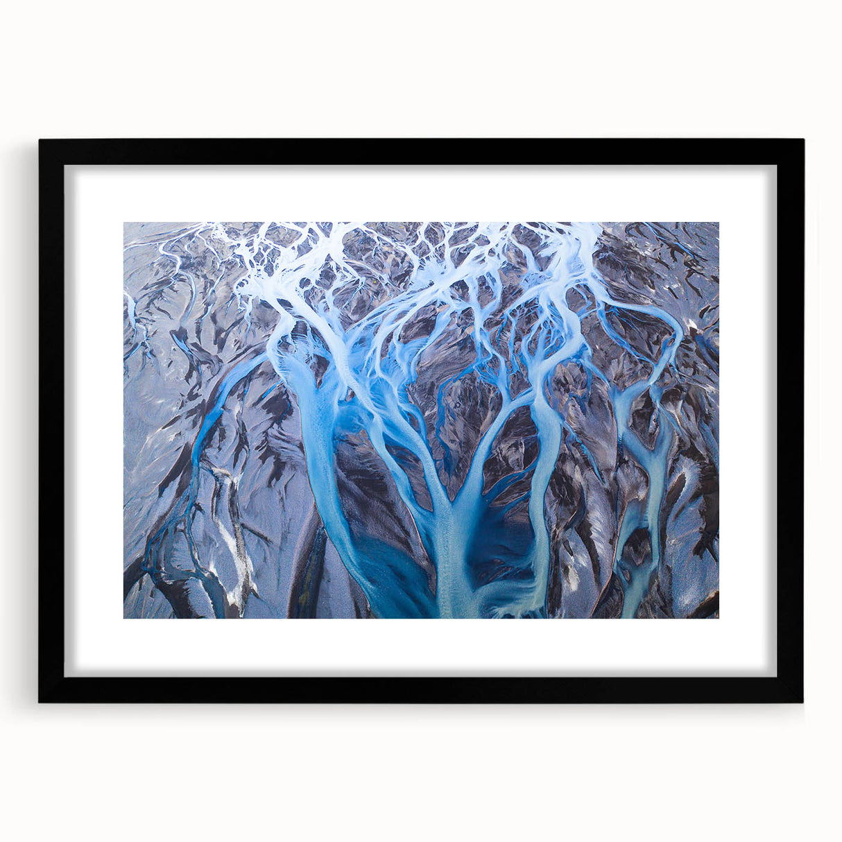 Extra large abstract art print depicting a colorful, textured Icelandic scenery on a black framed canvas.
