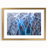 Textured abstract art print of an Icelandic landscape in muted blue and gray tones on a framed canvas, ideal for bedroom art.