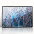 Large abstract wall art depicting a serene Icelandic landscape in muted gray and blue tones, framed in black acrylic.