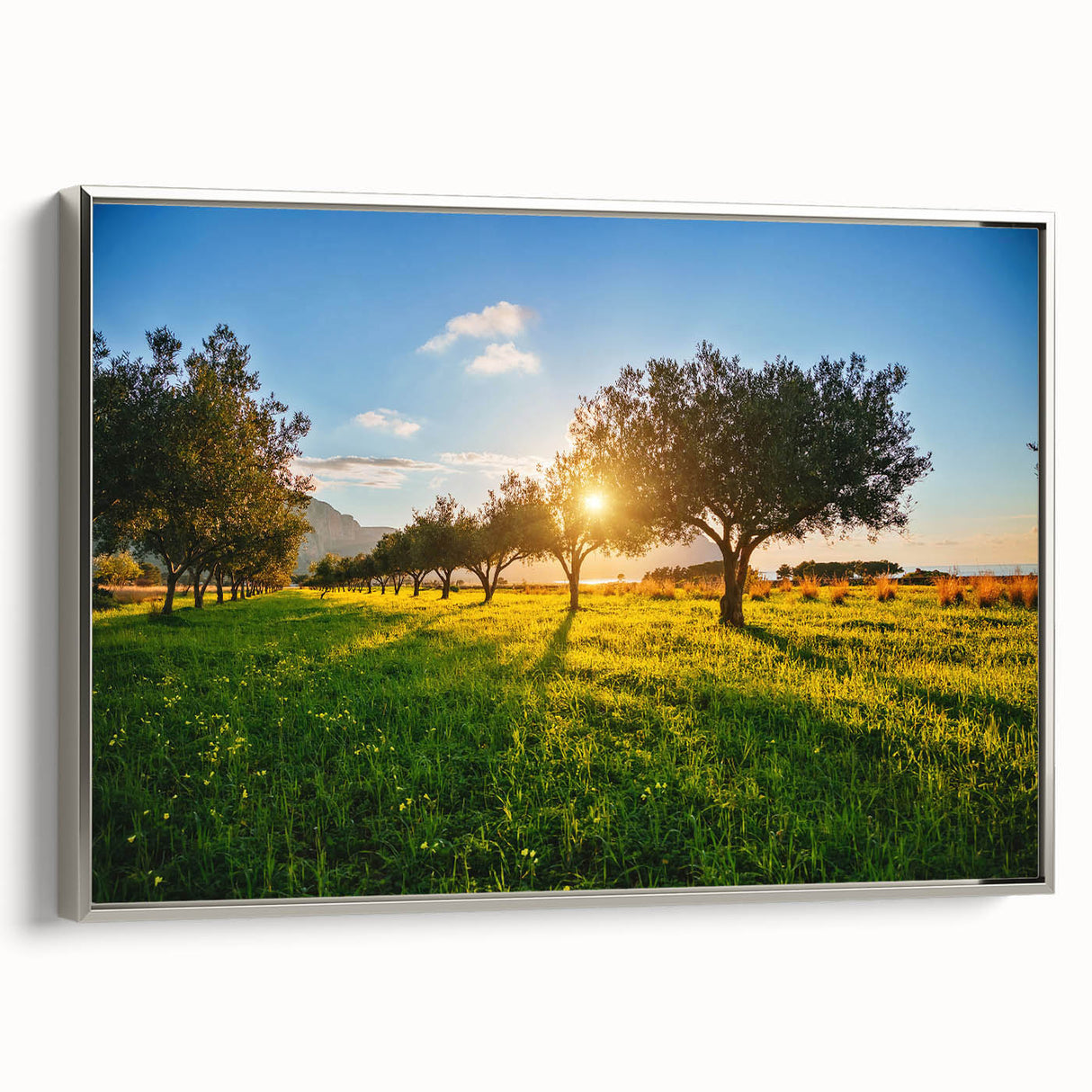 Landscape art painting of Sicilian scenery in muted earth tones on a silver-framed canvas, ideal for a dining room.