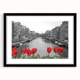 Colorful abstract art print of Venice scenery in vibrant hues on a large textured canvas, framed in black.