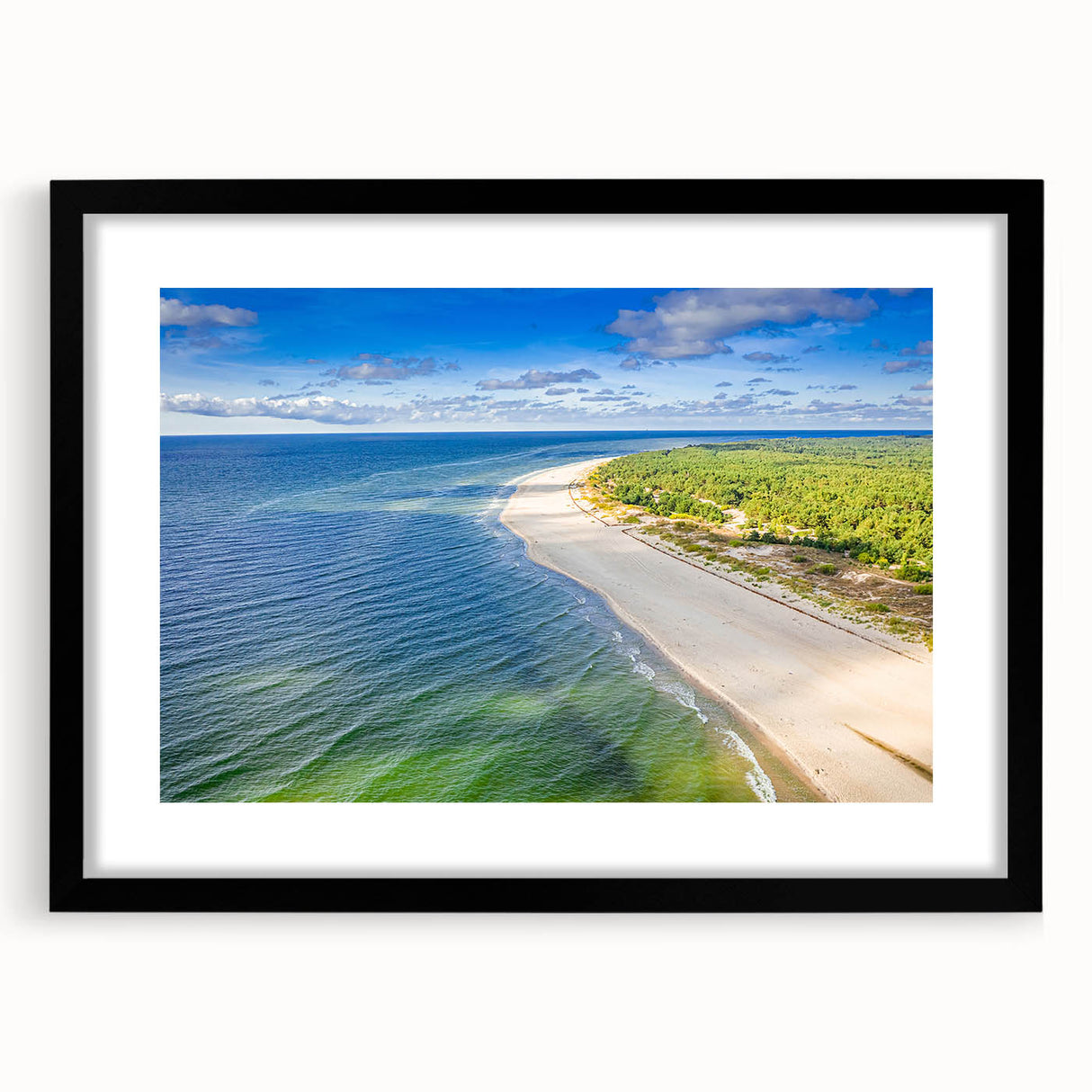 Abstract art print of European scenery in vibrant colors on a large, textured canvas, framed in black.