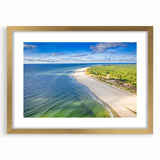 Abstract art print of a European scenery in muted gold and gray tones on a framed canvas, suitable for dining room decor.