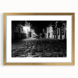 Abstract art print of Barcelona scenery in muted gold and blue tones, framed with a mat, ideal for dining room decor.